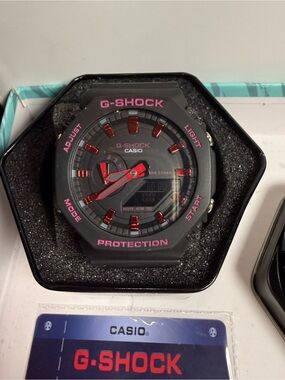 Casio G-Shock Black Watch with Pink and Red Accents